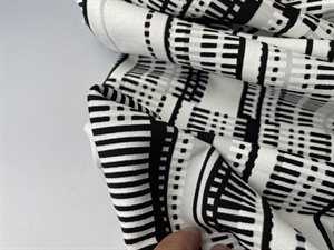 Polyester - firevejsstræk og kraftig kvalitet i offwhite og sort